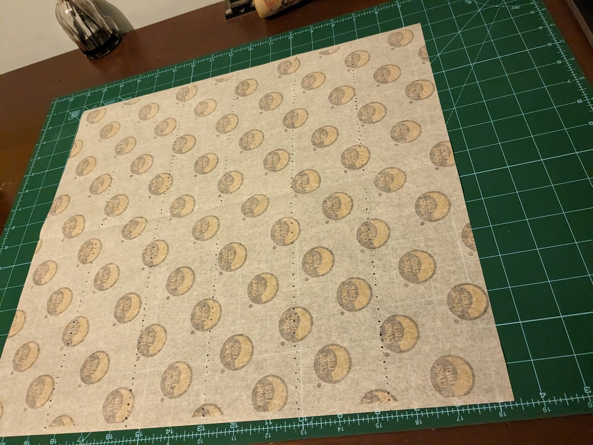 Full perforated wrapping paper sheet on a cutting mat