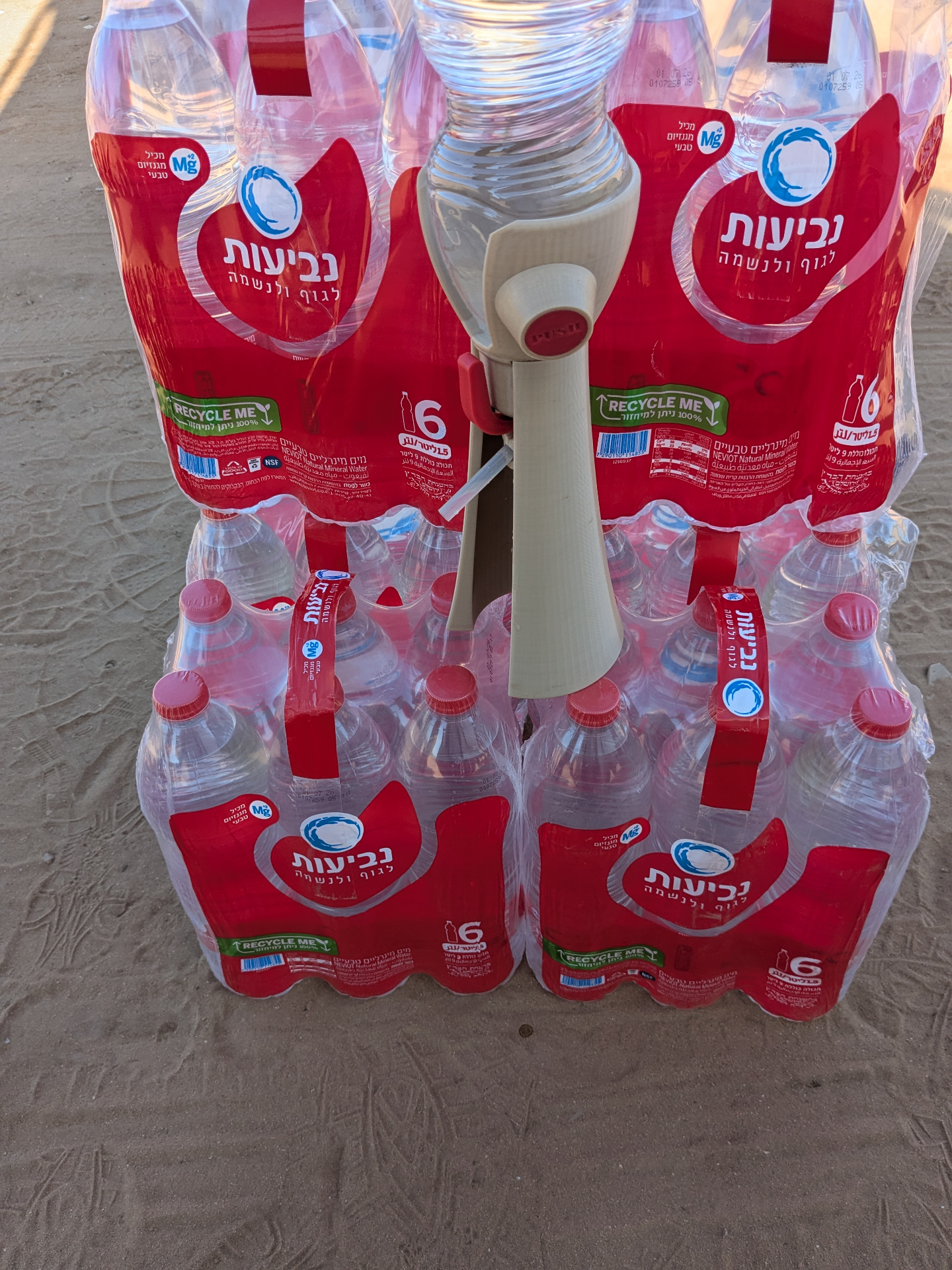 3D printed working prototype of H2GO mounted on a Neviot bottle